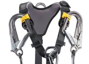 Black harness with yellow highlights showing yellow lanyard clips