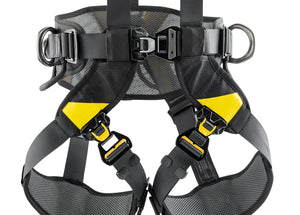 Black harness with yellow highlights legging close up