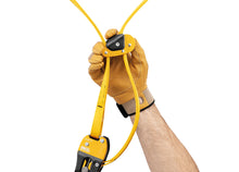 Load image into Gallery viewer, Gloved hand holding up Petzl Eject Adjustable Friction Saver